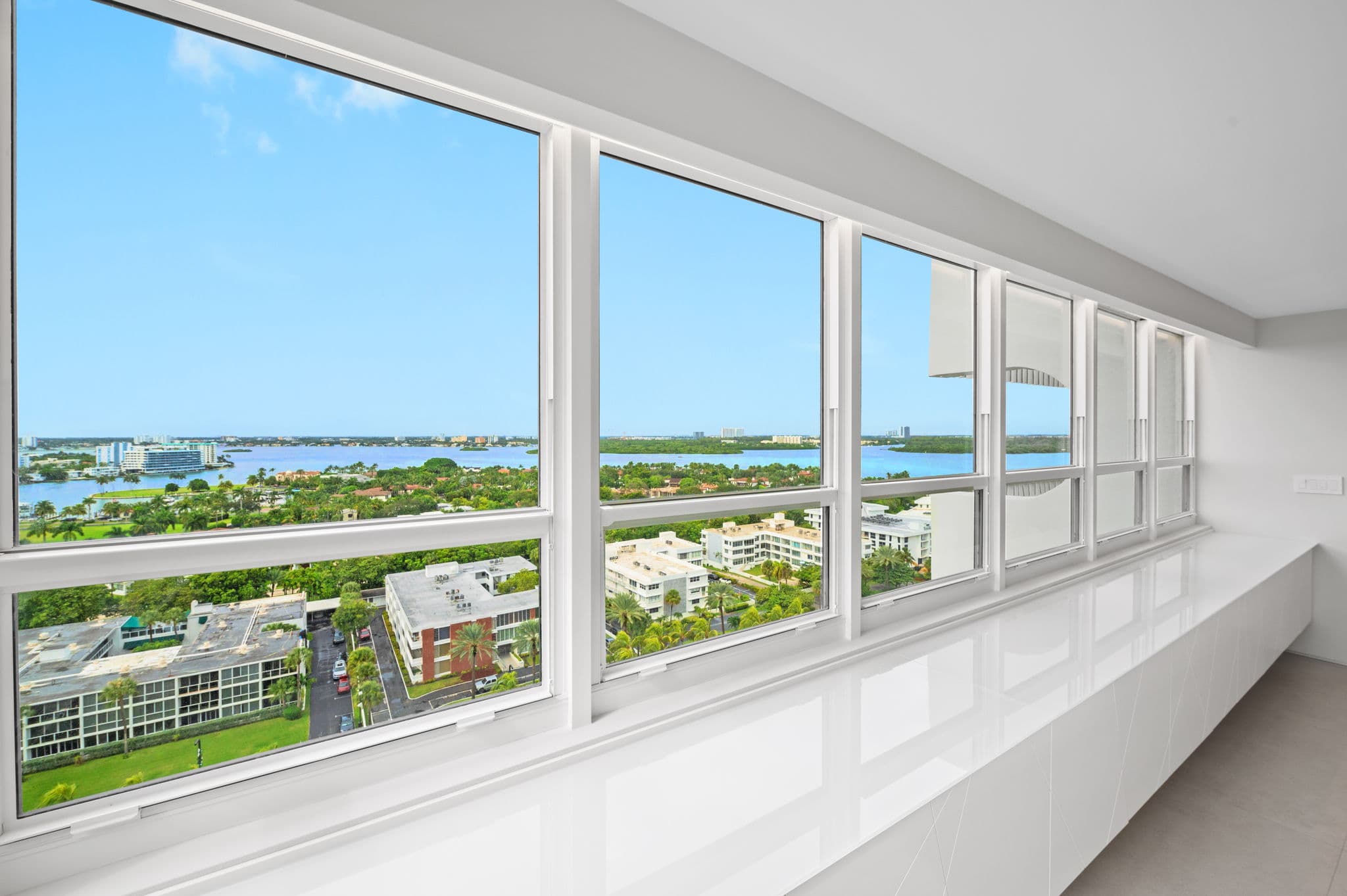 Spa bathroom featuring rainfall shower and freestanding soaking tub